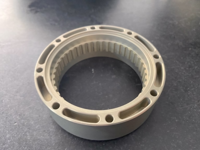 cnc cutting machine service producing a machined metal part